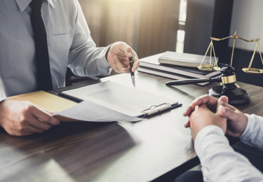 Lawyer discussing papwerwork
